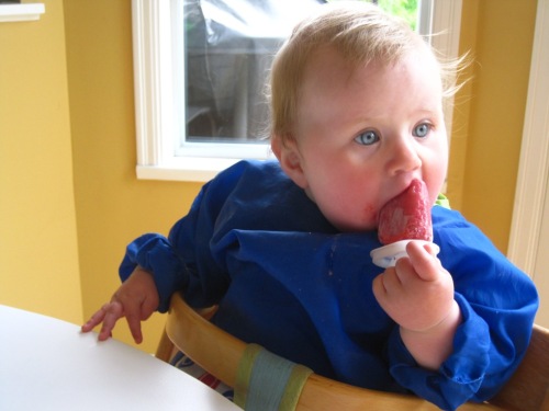 Baby eating popsicle